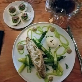 TORC - Deviled eggs with pickled onions and bacon, and asparagus with egg, black garlic, cubeb pepper and toast at TORC - New American Near Me - Napa, California TORC - Deviled eggs with pickled onions and bacon, and asparagus with egg, black garlic, cubeb pepper and toast at TORC - New American Near Me - Napa, California