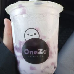 Medium Totaro Tapioca Milk Tea after I mixed it up and drank some. Has real taro chunks as well as taro paste.