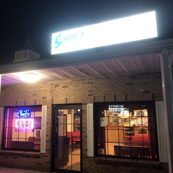Super Pizza - the outside of a restaurant at night - Pizza Near Me - Raynham, Massachusetts