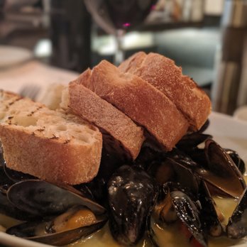 Onesto - Mussels - Shallots, garlic, fresno pepper, fresh herbs, grilled ciabatta, anise liqueur cream sauce. - Venues & Event Spaces Near Me - Milwaukee, Wisconsin