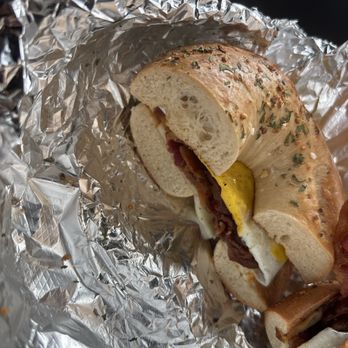 Corey's - Garlic Herb Bagel with egg bacon and cheese - Bagels Near Me - Dundee Township, Illinois Corey's - Garlic Herb Bagel with egg bacon and cheese - Bagels Near Me - Dundee Township, Illinois