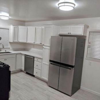 Alex's Home Solutions - a kitchen with stainless steel appliances - General Contractors Near Me