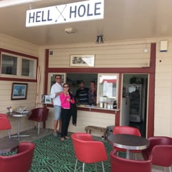 Hell Hole - Happy customers at the counter w/ owners.