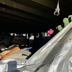 Be Junk Free - Carport full to the top before being remedied by Mike!