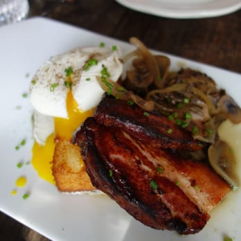 Table, Donkey and Stick - Duck Sausage - Biscuit and Gravy, Caramelized Kale, Poached Egg - Modern European Near Me - Chicago, Illinois Table, Donkey and Stick - Duck Sausage - Biscuit and Gravy, Caramelized Kale, Poached Egg - Modern European Near Me - Chicago, Illinois