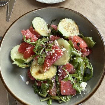 San Chez Bistro - ENSALÁDA DE SANDÍA arugula, watermelon, feta, cucumber, olive oil, balsamic vinegar, & maldon salt - Breakfast & Brunch Near Me - Grand Rapids, Michigan San Chez Bistro - ENSALÁDA DE SANDÍA arugula, watermelon, feta, cucumber, olive oil, balsamic vinegar, & maldon salt - Breakfast & Brunch Near Me - Grand Rapids, Michigan