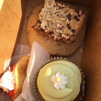 The Boujie Bakery - Green tea cupcake bottom right, top center chocolate chip walnut cookie under a magic bar. Also a fried cannoli with strawberries and cream. - Patisserie/Cake Shop Near Me - Cleveland Heights, Ohio The Boujie Bakery - Green tea cupcake bottom right, top center chocolate chip walnut cookie under a magic bar. Also a fried cannoli with strawberries and cream. - Patisserie/Cake Shop Near Me - Cleveland Heights, Ohio