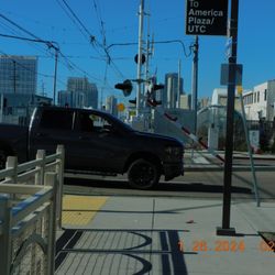 Barrio Logan Trolley Station - Many people dont watch when the barricades come down and run the signal smashing the barricade and that is death by the train ,