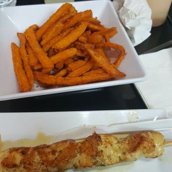 Emoji Burger - Juicy chicken skewer with an order of fried sweet potato fries...delicious!!! - Burgers Near Me - Jackson Heights, New York
