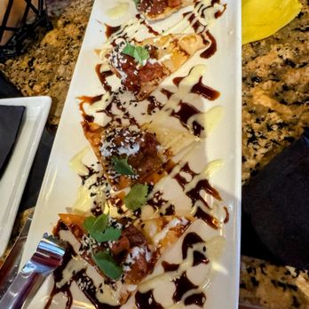 Eddie Merlot's - Ahi tuna over wontons $10 happy hour - Steakhouses Near Me - Bloomfield Hills, Michigan
