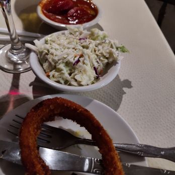 Village Restaurant - Onion ring garnish and sides (Cole Slaw and the Vegetable of the day - a tomato and zucchini stew) - Seafood Near Me - Chincoteague, Virginia Village Restaurant - Onion ring garnish and sides (Cole Slaw and the Vegetable of the day - a tomato and zucchini stew) - Seafood Near Me - Chincoteague, Virginia