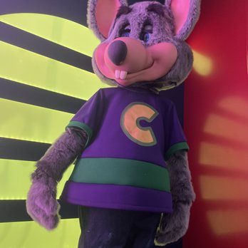 Chuck E. Cheese - a mascot in a t - shirt - Pizza Near Me - Phoenix, Arizona