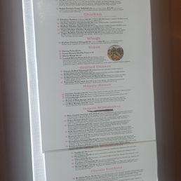 Menu on the wall near host station