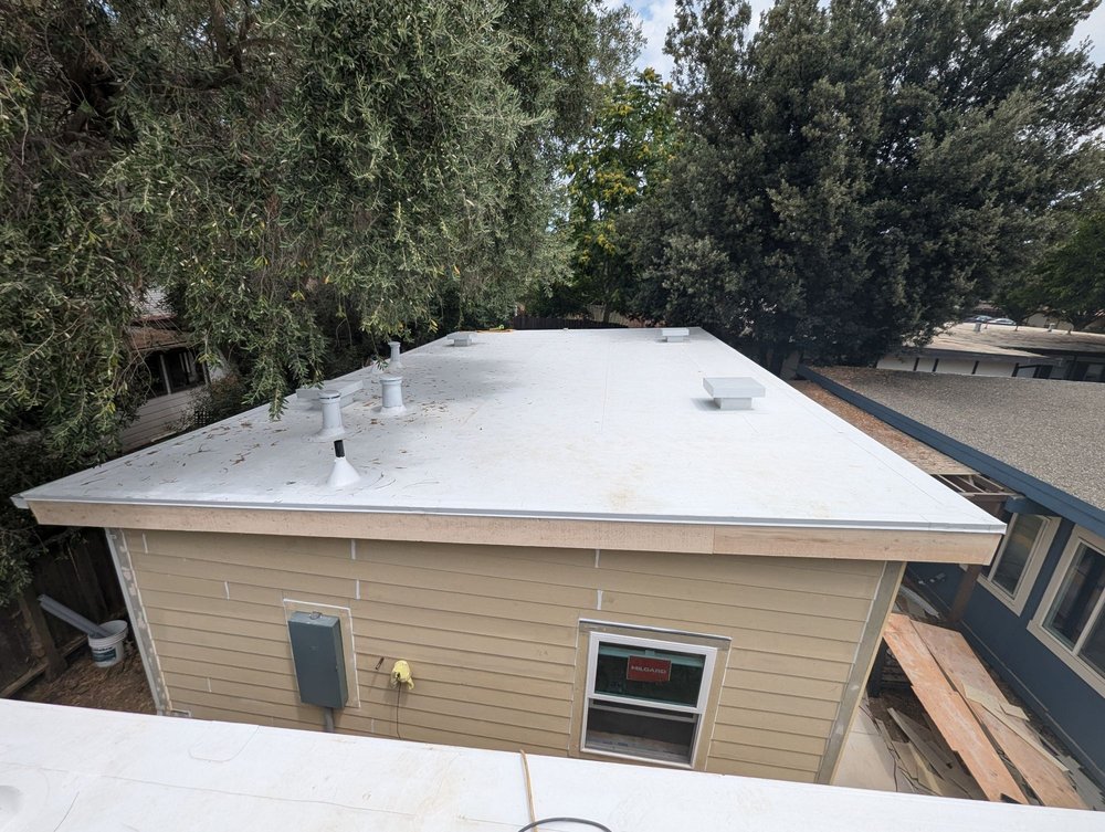 Slide of Samperios Roofing