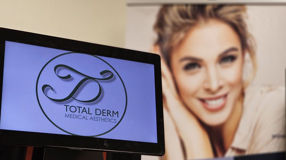 Total Derm Aesthetic Center Logo