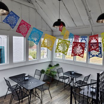 Pie Town Tacos - tables and chairs in a sunroom - Tacos Near Me - Nashville, Tennessee Pie Town Tacos - tables and chairs in a sunroom - Tacos Near Me - Nashville, Tennessee