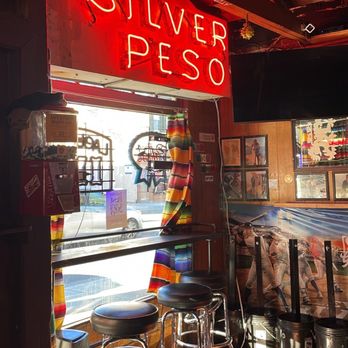 Silver Peso Bar - a neon sign for a silver peso - Dive Bars Near Me - Larkspur, California Silver Peso Bar - a neon sign for a silver peso - Dive Bars Near Me - Larkspur, California