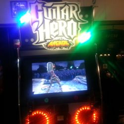 Retro City Rockade - Challenge someone to a duel in Guitar hero many great well known songs to play