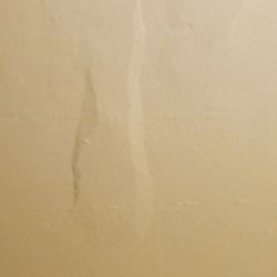 Bananas Guesthouse - Plaster failing