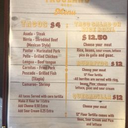 a menu for tacos and salad