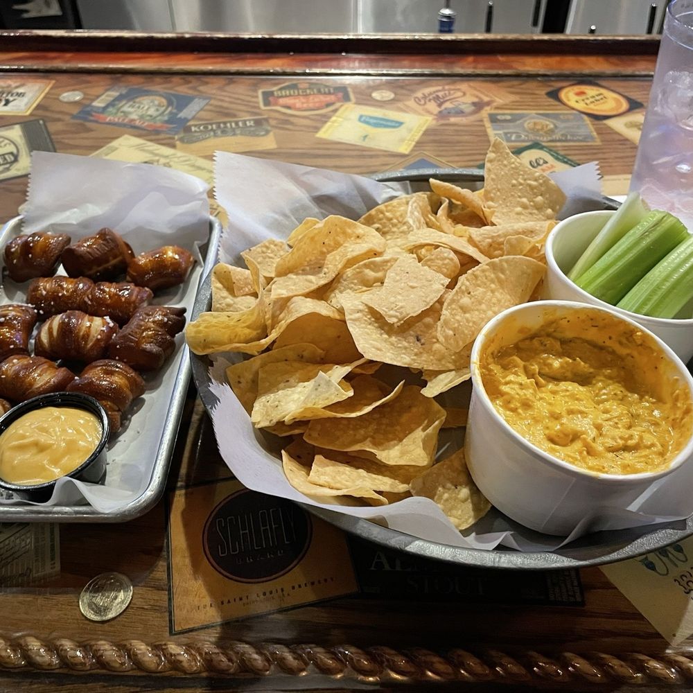 Tap 216 - Pub Pretzels with Beer Cheese and Buffalo Ranch Chicken Dip with Tortilla Chips and Celery - Bars Near Me - Murray, Kentucky Tap 216 - Pub Pretzels with Beer Cheese and Buffalo Ranch Chicken Dip with Tortilla Chips and Celery - Bars Near Me - Murray, Kentucky