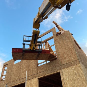 Rainier Contracting Services - Bringing materials up with the forklift to frame more walls. - General Contractors Near Me Rainier Contracting Services - Bringing materials up with the forklift to frame more walls. - General Contractors Near Me
