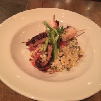 Taverna Mercatto - Spiedini - grilled octopus on a bed of fregula with delicious bits of black olive tapenade. 3 - Italian Near Me - Toronto, Ontario Taverna Mercatto - Spiedini - grilled octopus on a bed of fregula with delicious bits of black olive tapenade. 3 - Italian Near Me - Toronto, Ontario