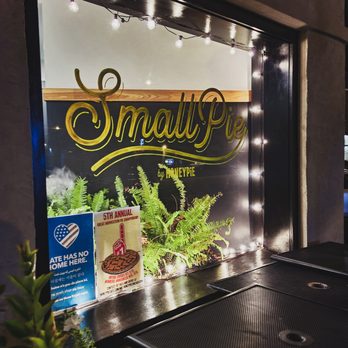 SmallPie - a window with a sign that says smallpie - Cafes Near Me - Milwaukee, Wisconsin SmallPie - a window with a sign that says smallpie - Cafes Near Me - Milwaukee, Wisconsin