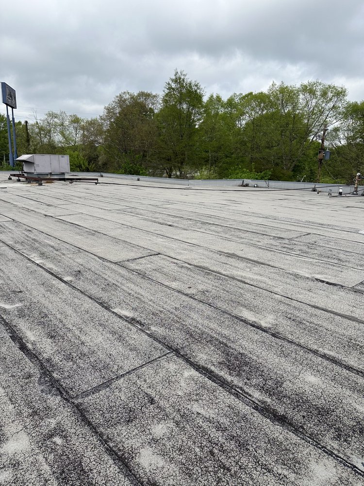 Slide of Capital Roofing