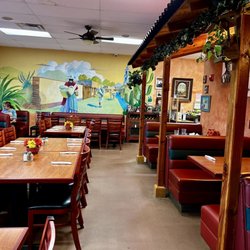 Casa de Lucy - I liked the area on the right side, it looks like it has a roof over some of the booths, it has a nice and cozy feel.