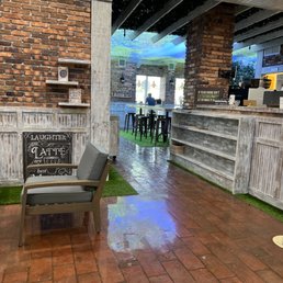 a view of the bar and seating area