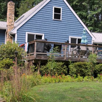 E & E General Contracting - a blue house with a deck - Windows Installation Near Me - Gap, Pennsylvania E & E General Contracting - a blue house with a deck - Windows Installation Near Me - Gap, Pennsylvania