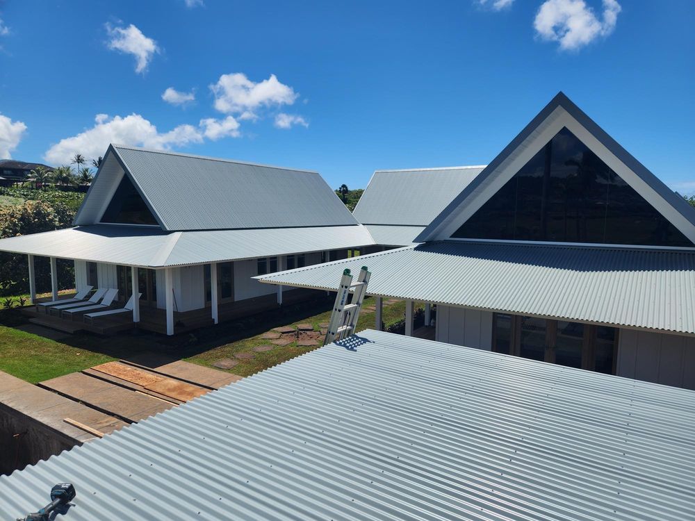 Slide of Metal Roof Pros-Kaua'i Roof Installers