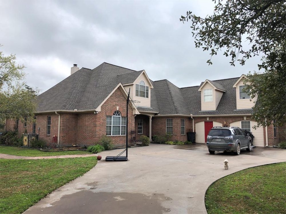 Slide of Vincent's Roofing