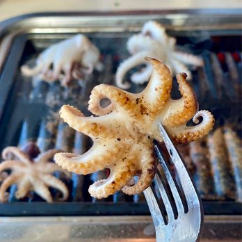 Han Garden Korean Restaurant - an octopus on a fork - Korean Near Me - San Antonio, Texas Han Garden Korean Restaurant - an octopus on a fork - Korean Near Me - San Antonio, Texas