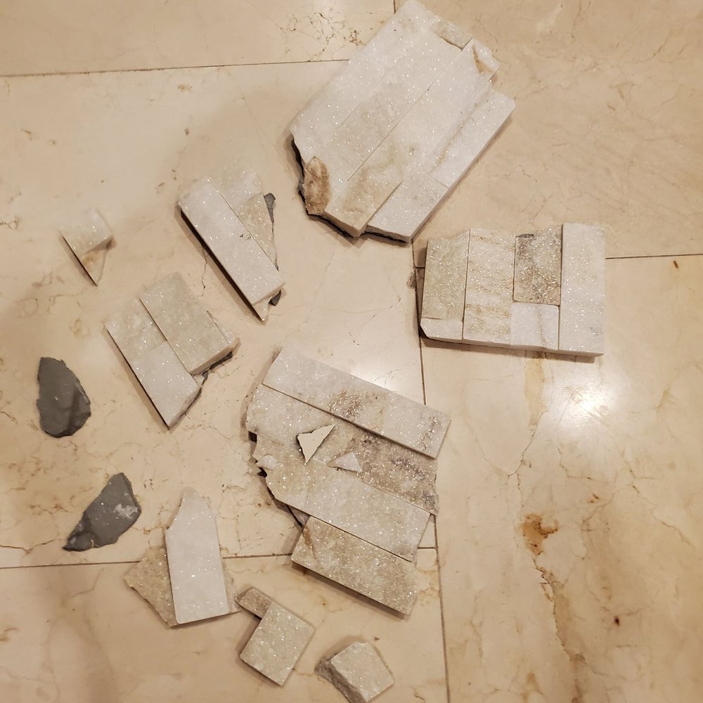 Creative Home Enhancement - Broken tiles that were put up by them - Flooring Near Me - Anthem, Arizona Creative Home Enhancement - Broken tiles that were put up by them - Flooring Near Me - Anthem, Arizona