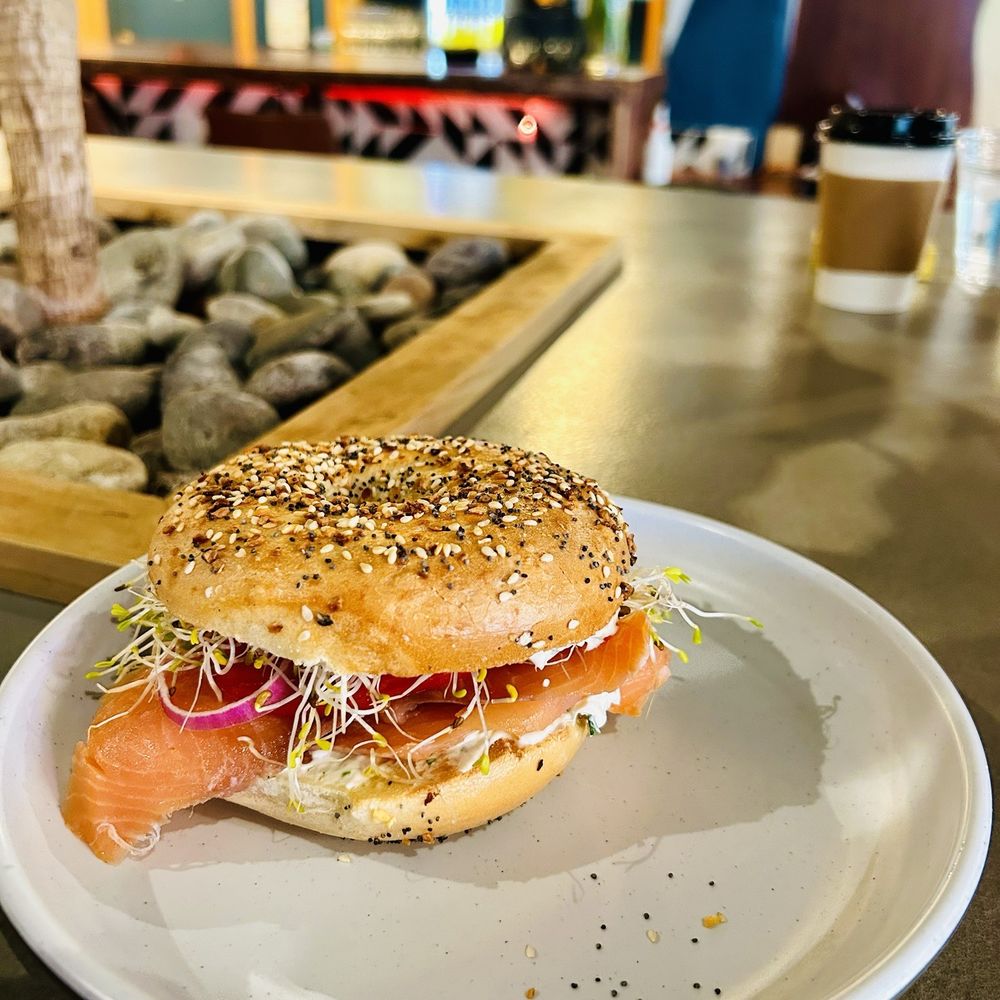 Dona Posada - Smoked salmon sandwich on an Everything bagel. Amazing! - Juice Bars & Smoothies Near Me - Miami, Florida Dona Posada - Smoked salmon sandwich on an Everything bagel. Amazing! - Juice Bars & Smoothies Near Me - Miami, Florida