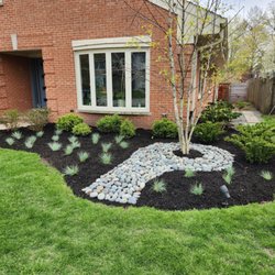 Green Concepts - black mulch with little blue fescue