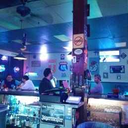 people sitting at a bar