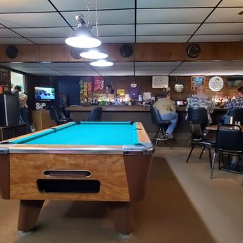Heck's Bar - Well stocked bar and plenty of tables. - Bars Near Me - Kinde, Michigan