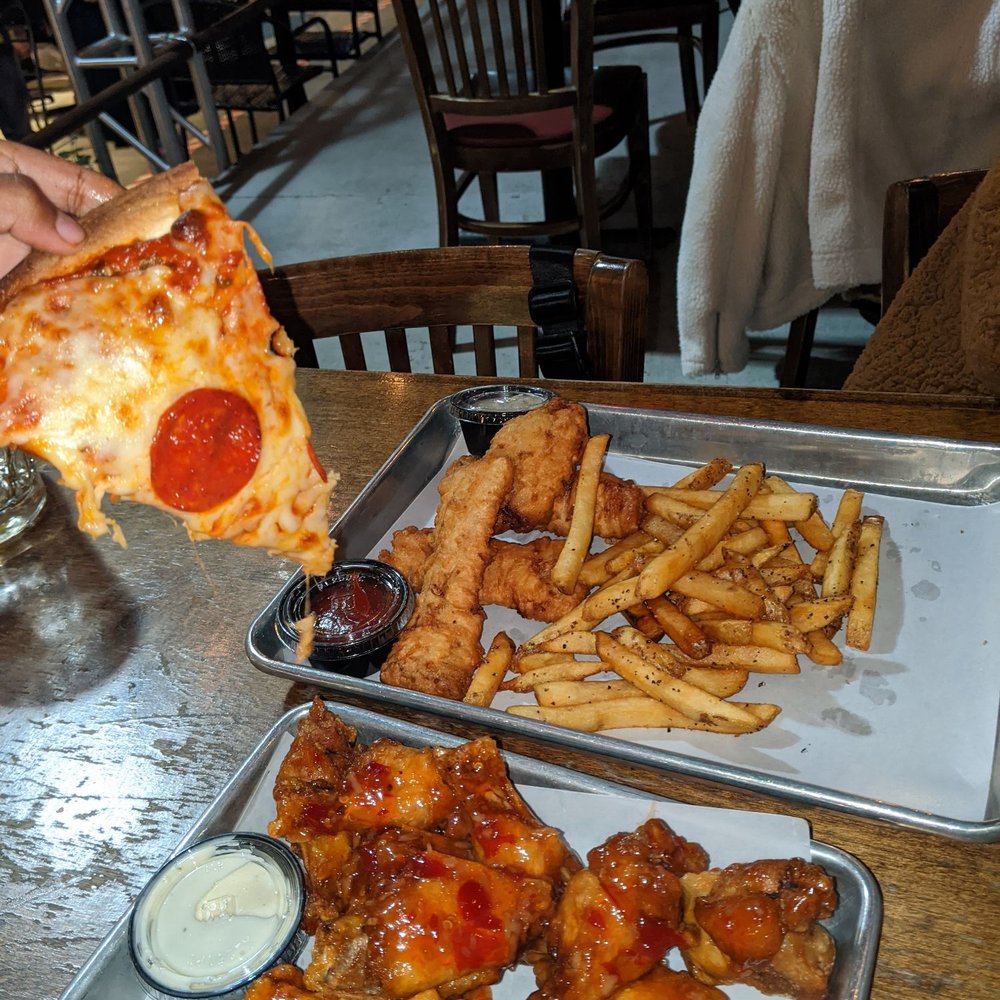 Blarney Station - Thin crust pizza Thai chili wings Fish and chips - Pubs Near Me - East Rutherford, New Jersey Blarney Station - Thin crust pizza Thai chili wings Fish and chips - Pubs Near Me - East Rutherford, New Jersey