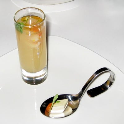 Photo of Cortez - San Francisco, CA, US. soup shot (melon with spicy prawns), and amuse of lemongrass panna cotta