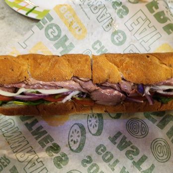 Subway - a sub sandwich on a wrapper - Sandwiches Near Me - Arlington Heights, Illinois Subway - a sub sandwich on a wrapper - Sandwiches Near Me - Arlington Heights, Illinois