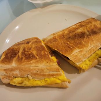 Sandy's Cafe - Breakfast sandwich with bacon on Cuban bread - Cuban Near Me - Key West, Florida Sandy's Cafe - Breakfast sandwich with bacon on Cuban bread - Cuban Near Me - Key West, Florida