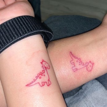 Authentic Roots Tattoo - Mini red ink dinosaurs - Tattoo Near Me - Long Beach, California Authentic Roots Tattoo - Mini red ink dinosaurs - Tattoo Near Me - Long Beach, California
