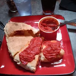 Aggies Chophouse - Calzone and pizza.
