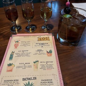 The SOS Tiki Bar - Rum flight, Bananimal and menu - Caribbean Near Me - Decatur, Georgia