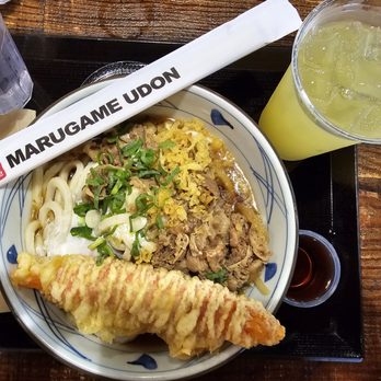 Marugame Udon - $15 Cold Nikutama Combo (+$2 large bowl udon) includes a Tempura (imitation crab) and Signature Beverage (Calamansi)... awesome set. - Japanese Near Me - Honolulu, Hawaii Marugame Udon - $15 Cold Nikutama Combo (+$2 large bowl udon) includes a Tempura (imitation crab) and Signature Beverage (Calamansi)... awesome set. - Japanese Near Me - Honolulu, Hawaii