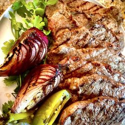 Thin cut NY strips I grilled up. Satisfied.