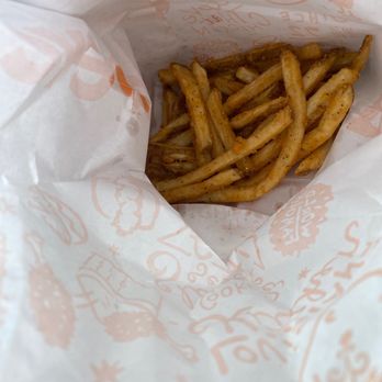 Popeyes Louisiana Kitchen - french fries in a paper bag - Chicken Wings Near Me - Providence, Rhode Island